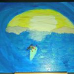 La surfeuse au coucher de soleil