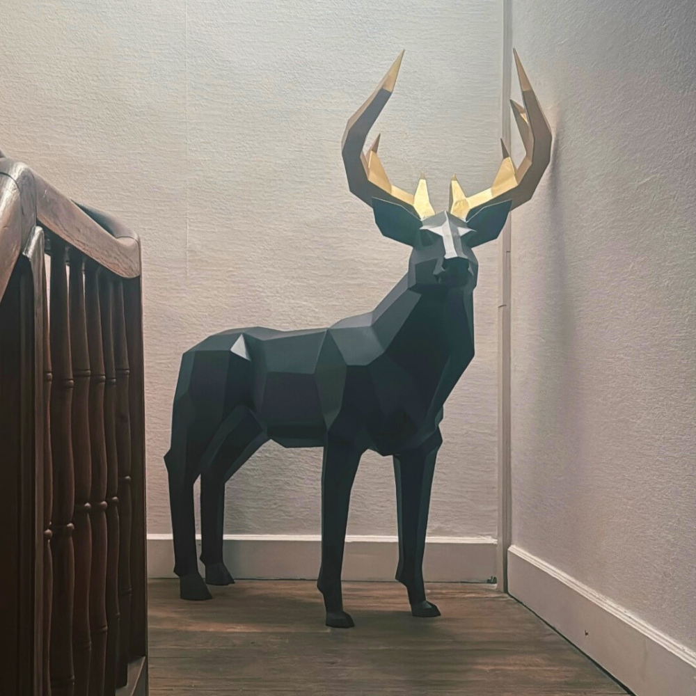 sculpture-dun-cerf-en-metal-acier