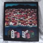 Peinture à l\'huile sur bois d\'un paysage d\'une ville au bord de la mer